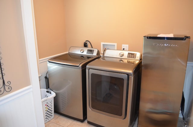 55 Cloudland Rd, North Haven, CT 06473 - laundry room with independent washer and dryer, a wainscoted wall, and light tile patterned flooring