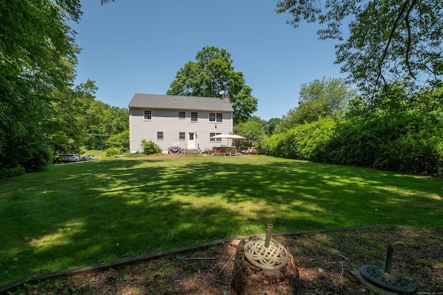 791 Ives Row, Cheshire, CT 06410 - back of house featuring a yard