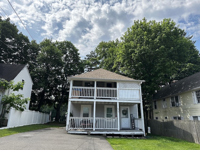 72 Beech St, Bristol, CT 06010 - view of front of property featuring a balcony, a porch, and a shingled roof