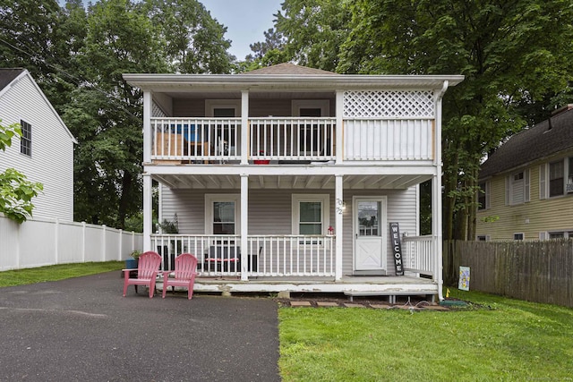 72 Beech St, Bristol, CT 06010 - view of front of home with a balcony and covered porch