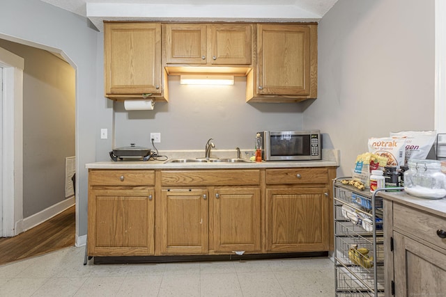 72 Beech St, Bristol, CT 06010 - kitchen featuring stainless steel microwave and light countertops
