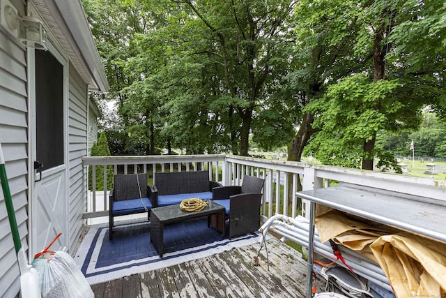 72 Beech St, Bristol, CT 06010 - wooden terrace with an outdoor living space and view of wooded area