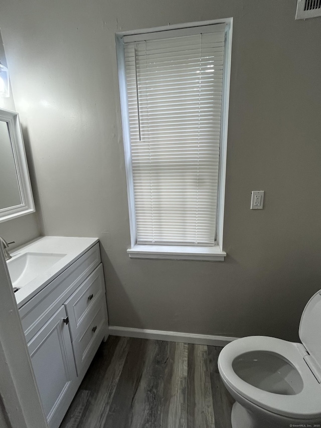 20 Cossett St, Waterbury, CT 06704 - half bath with vanity and wood finished floors