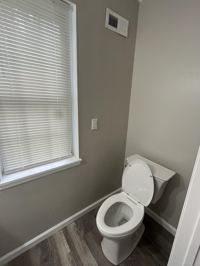20 Cossett St, Waterbury, CT 06704 - bathroom featuring baseboards and wood finished floors