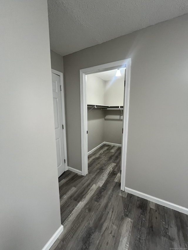 20 Cossett St, Waterbury, CT 06704 - hall featuring dark wood-type flooring and a textured ceiling