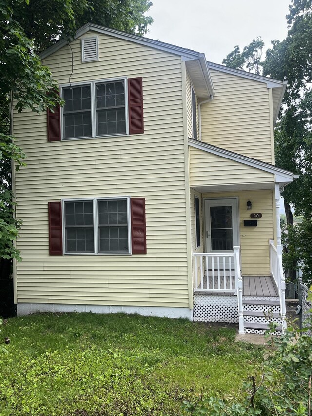 20 Cossett St, Waterbury, CT 06704 - view of front facade with a front lawn