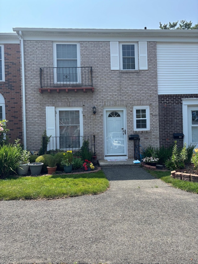 42 Salem Walk Unit 42, Milford, CT 06460 - townhome / multi-family property with brick siding and a balcony
