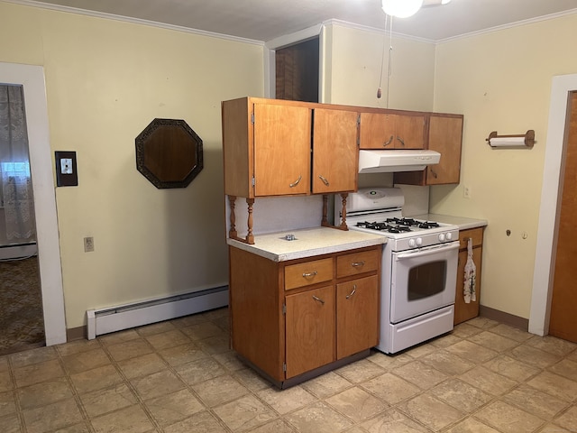 48 Anderson St, Naugatuck, CT 06770 - kitchen with white gas range oven, a baseboard radiator, under cabinet range hood, light countertops, and brown cabinets