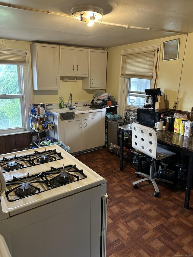 48 Anderson St, Naugatuck, CT 06770 - kitchen featuring range, a sink, and black microwave