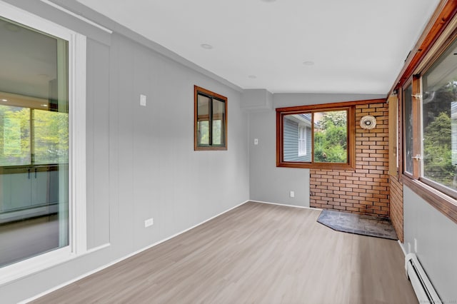 890 Copper Hill Rd, Suffield, CT 06093 - unfurnished sunroom featuring a baseboard heating unit