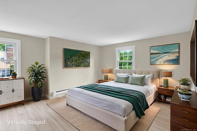 890 Copper Hill Rd, Suffield, CT 06093 - bedroom with light wood-style floors