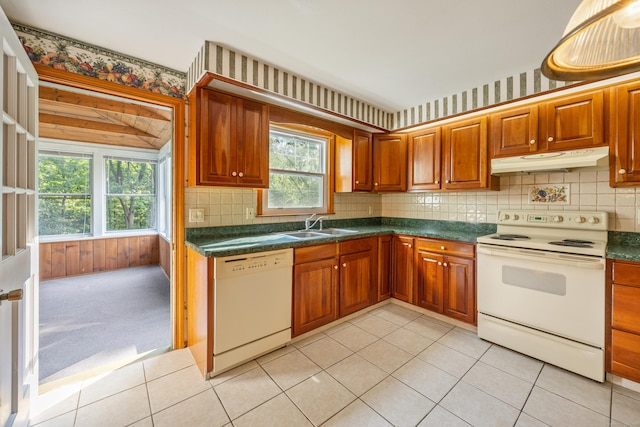 10 Longview Ln, Wallingford, CT 06492 - kitchen featuring white appliances, under cabinet range hood, dark countertops, and tasteful backsplash