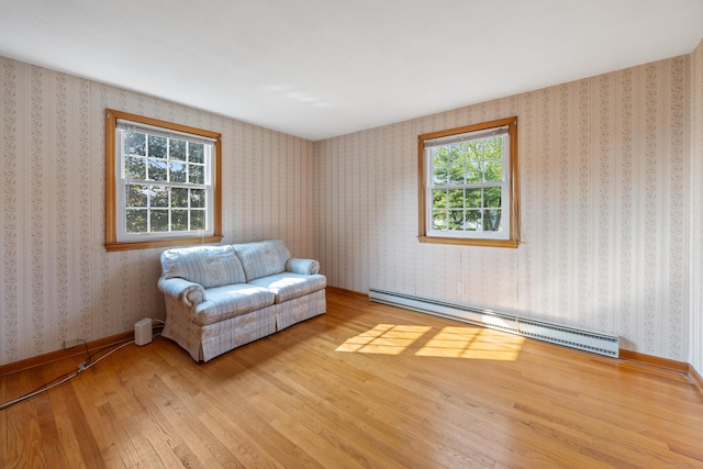 10 Longview Ln, Wallingford, CT 06492 - living area featuring a baseboard radiator and wood finished floors