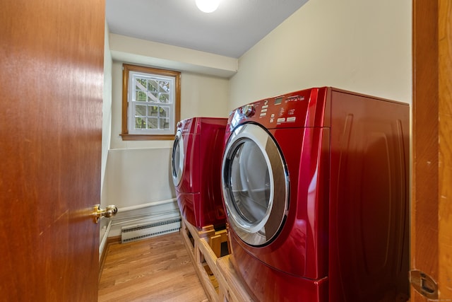 10 Longview Ln, Wallingford, CT 06492 - laundry room with baseboard heating, washing machine and dryer, and wood finished floors