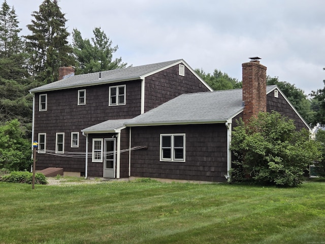 7 Michael Rd, Simsbury, CT 06070 - rear view of property with a chimney, a lawn, and a shingled roof