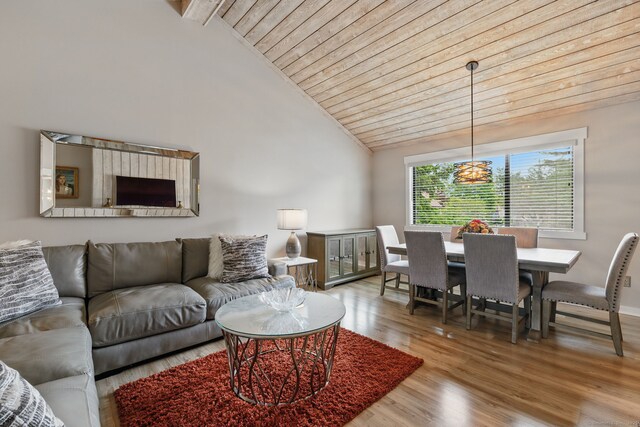 646 Onondaga Ln Unit B, Stratford, CT 06614 - living room with wooden ceiling with exposed beams, wood finished floors, and high vaulted ceiling