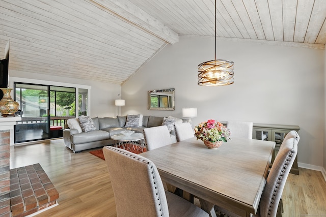 646 Onondaga Ln Unit B, Stratford, CT 06614 - dining area with light wood-style flooring, wood ceiling, and a chandelier