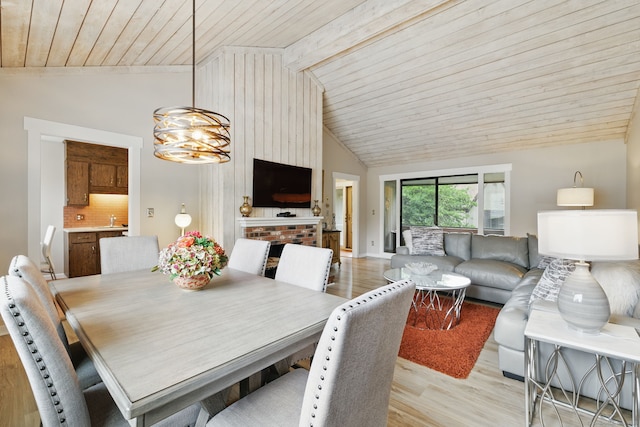 646 Onondaga Ln Unit B, Stratford, CT 06614 - dining space with light wood-type flooring, wood ceiling with exposed beams, a chandelier, and high vaulted ceiling