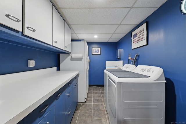 646 Onondaga Ln Unit B, Stratford, CT 06614 - washroom featuring cabinet space, washer and dryer, dark tile patterned flooring, and recessed lighting