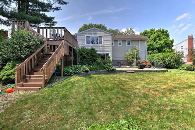17 Farmstead Ln, West Hartford, CT 06117 - rear view of property featuring a lawn, a deck, and stairs
