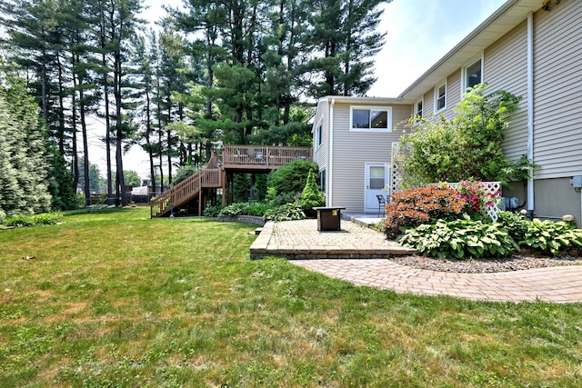 17 Farmstead Ln, West Hartford, CT 06117 - view of grassy yard featuring stairway, a deck, and a patio
