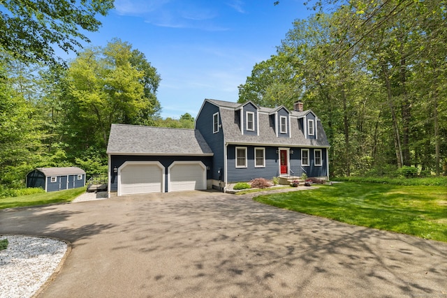 43 Debi Cir, Colchester, CT 06415 - dutch colonial featuring driveway, a shingled roof, an attached garage, a gambrel roof, and a chimney