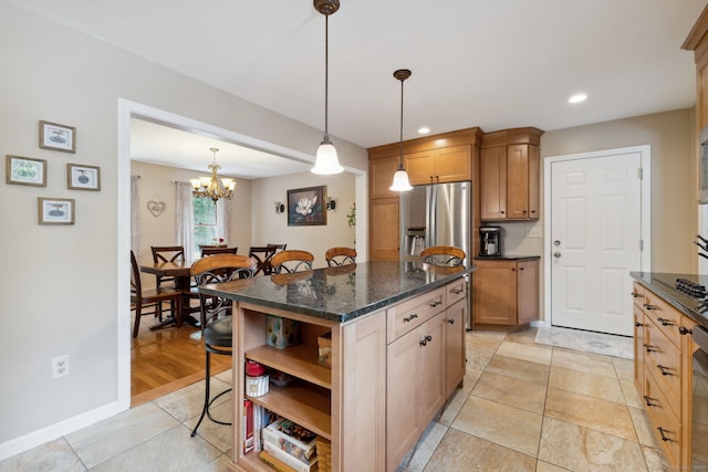 43 Debi Cir, Colchester, CT 06415 - kitchen with open shelves, a kitchen breakfast bar, a kitchen island, decorative light fixtures, and recessed lighting
