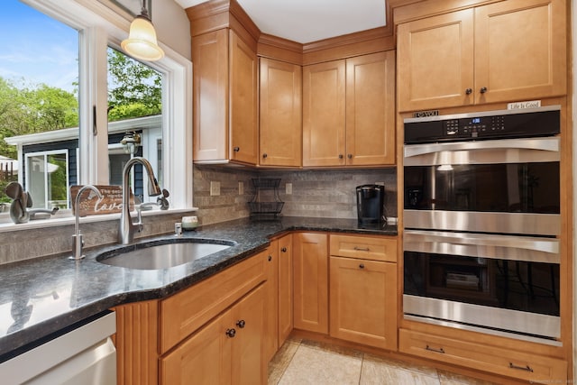 43 Debi Cir, Colchester, CT 06415 - kitchen with appliances with stainless steel finishes, a sink, backsplash, dark stone counters, and light tile patterned flooring