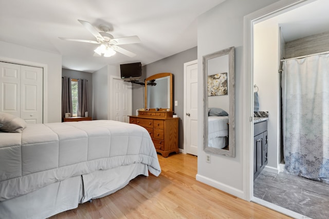 43 Debi Cir, Colchester, CT 06415 - bedroom featuring multiple closets, light wood-type flooring, baseboards, and ceiling fan