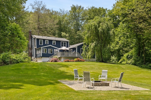 43 Debi Cir, Colchester, CT 06415 - back of house featuring an outdoor fire pit, stairway, a wooden deck, a chimney, and a lawn