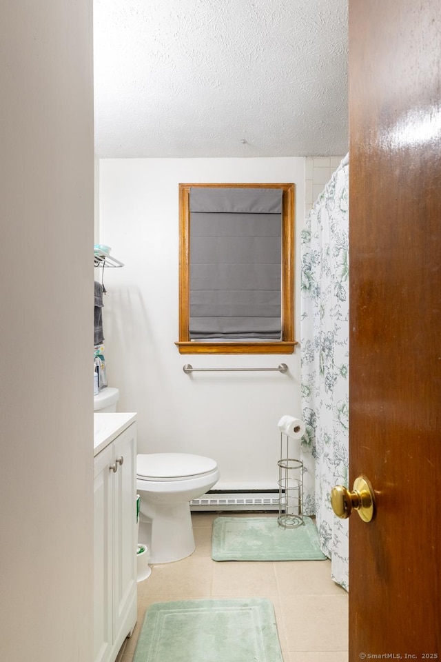 39 Mechanic St, Bristol, CT 06010 - full bathroom featuring a baseboard radiator, vanity, tile patterned floors, and a shower with shower curtain