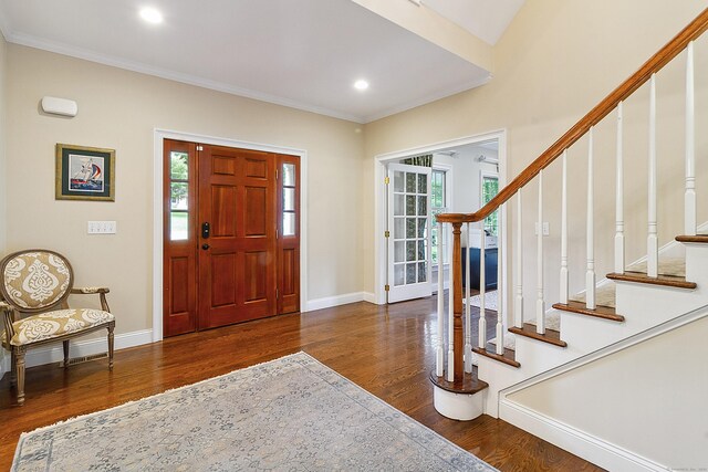 11 Delno Dr, Danbury, CT 06811 - entryway featuring wood finished floors, healthy amount of natural light, stairway, ornamental molding, and recessed lighting