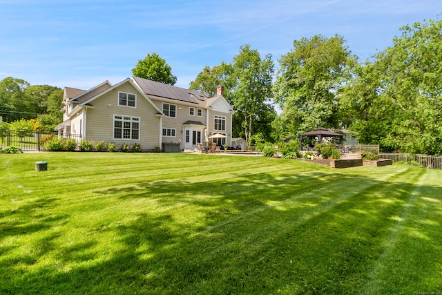 11 Delno Dr, Danbury, CT 06811 - back of property with a gazebo and a chimney