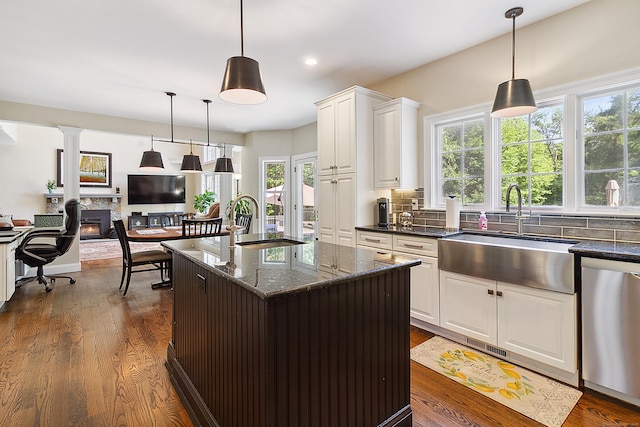 11 Delno Dr, Danbury, CT 06811 - kitchen with a sink, stainless steel dishwasher, healthy amount of natural light, tasteful backsplash, and recessed lighting