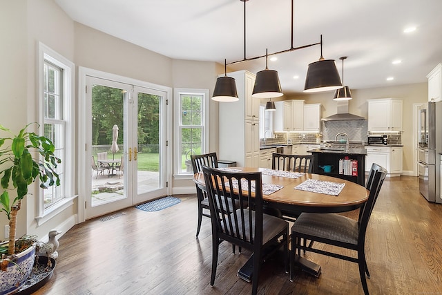 11 Delno Dr, Danbury, CT 06811 - dining area featuring dark wood-type flooring, baseboards, and recessed lighting