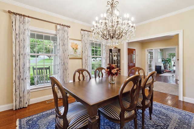 11 Delno Dr, Danbury, CT 06811 - dining area with baseboards, a chandelier, french doors, wood finished floors, and crown molding