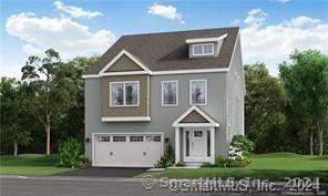 22 Lombard Cir Unit 22, North Haven, CT 06473 - view of front of house featuring an attached garage, driveway, and a front yard