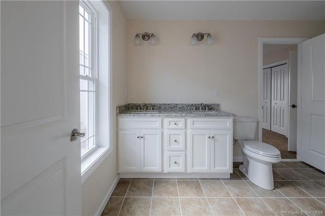 22 Lombard Cir Unit 22, North Haven, CT 06473 - full bath with double vanity and tile patterned floors