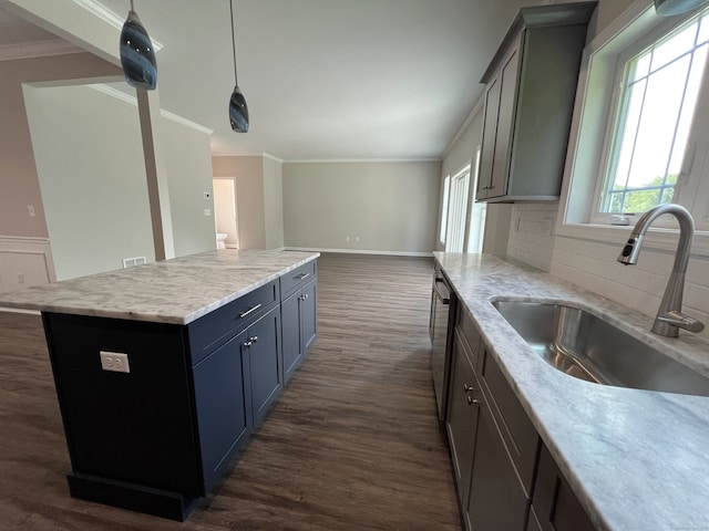 20 Lombard Cir Unit 20, North Haven, CT 06473 - kitchen with ornamental molding, dark wood finished floors, tasteful backsplash, a kitchen island, and open floor plan