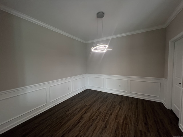 20 Lombard Cir Unit 20, North Haven, CT 06473 - unfurnished dining area with a chandelier, ornamental molding, wainscoting, dark wood-type flooring, and a decorative wall
