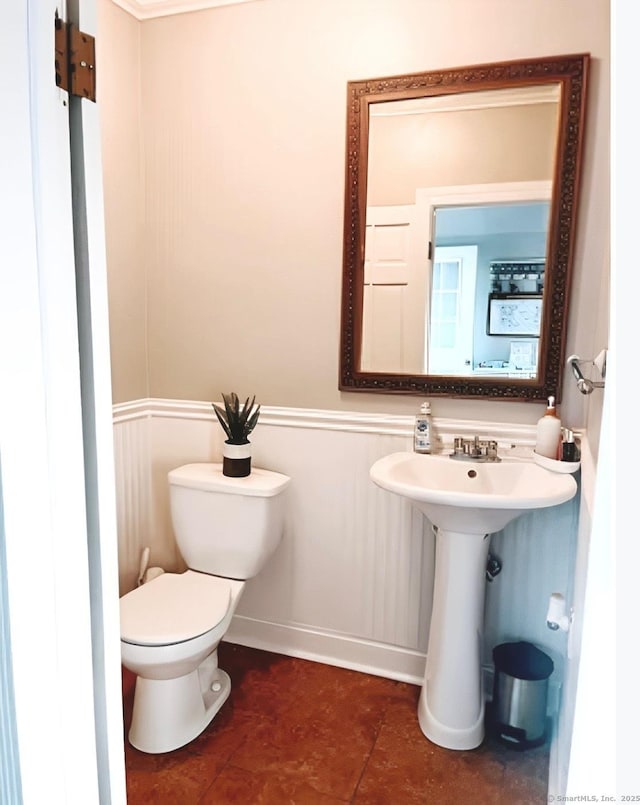 92 Curtiss St, Naugatuck, CT 06770 - half bath featuring toilet and tile patterned floors