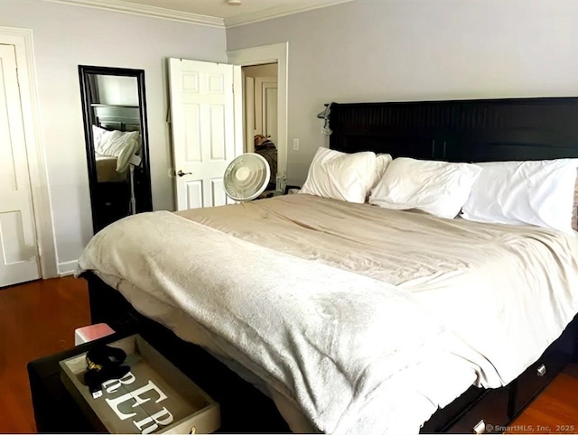 92 Curtiss St, Naugatuck, CT 06770 - bedroom with dark wood finished floors and crown molding