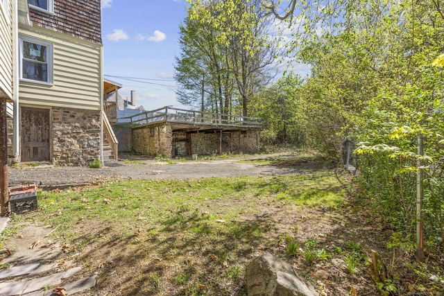 480 W St, Bristol, CT 06010 - view of yard with stairway and a wooden deck
