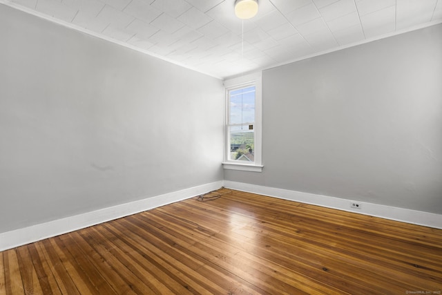 480 W St, Bristol, CT 06010 - empty room with ornamental molding and hardwood / wood-style flooring