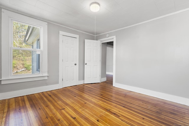480 W St, Bristol, CT 06010 - empty room featuring ornamental molding and hardwood / wood-style flooring