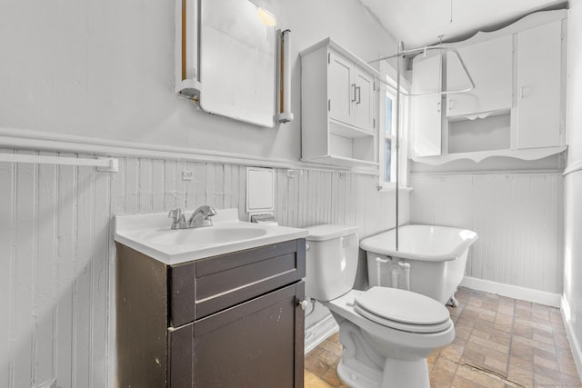 480 W St, Bristol, CT 06010 - full bathroom featuring vanity, a wainscoted wall, brick patterned flooring, and a freestanding tub