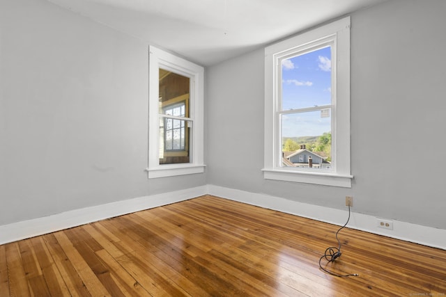 480 W St, Bristol, CT 06010 - unfurnished room featuring plenty of natural light and hardwood / wood-style flooring