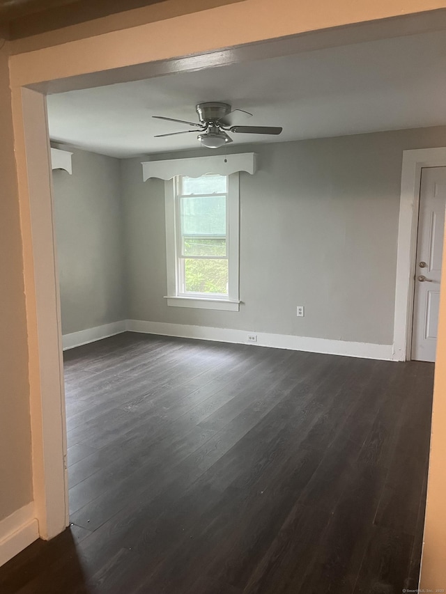 480 W St, Bristol, CT 06010 - empty room featuring dark wood-style flooring and ceiling fan
