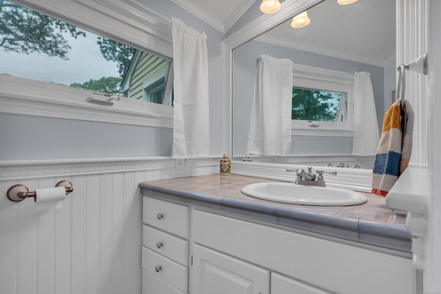 19 W Hills Rd, Essex, CT 06442 - bathroom with vanity, crown molding, and wainscoting