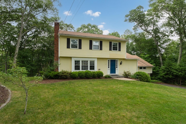 19 W Hills Rd, Essex, CT 06442 - colonial house featuring a chimney and a front lawn